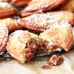 Deep Fried Pecan Pies on cooling rack.