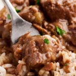 Forkful of Slow Cooker Beef Tips and Rice.