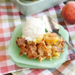 Peach Cobbler on a green dish.