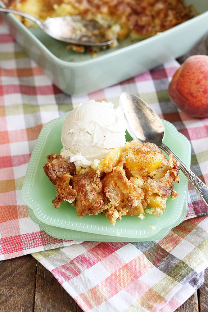 Peach Cobbler on a green dish.