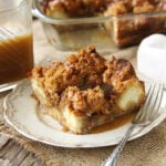 Slice of bread pudding with caramel sauce.