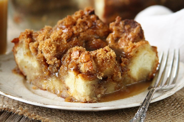 Slice of bread pudding with caramel sauce.