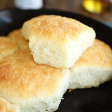 Biscuits in a cast iron skillet.