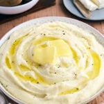 Cream Cheese Mashed Potatoes with butter on top.