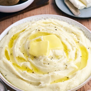 Cream Cheese Mashed Potatoes with butter on top.