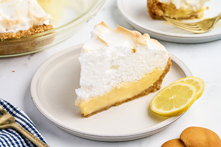 Slice of Lemon Icebox Pie on a plate.