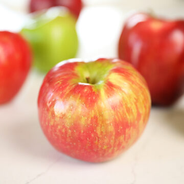 Different Apples on counter.