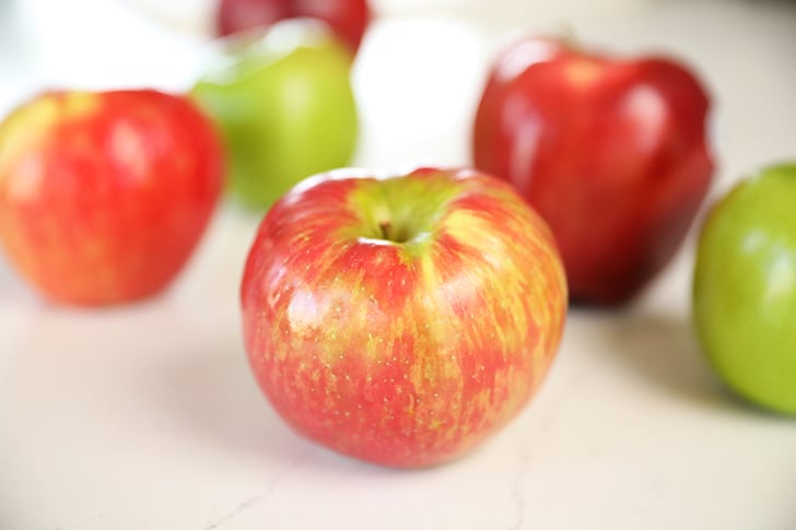 Different Apples on counter.