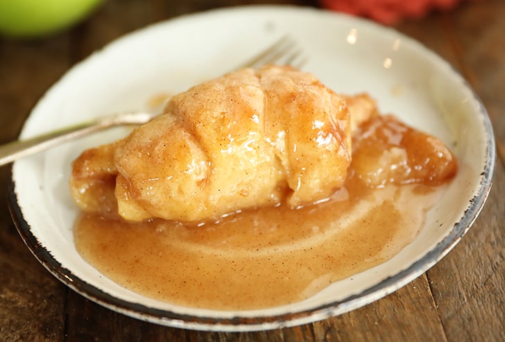 Apple dumpling on plate.