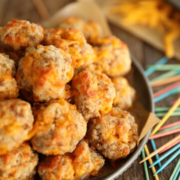 Sausage Balls on a plate with toohpicks.