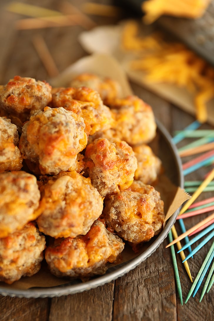 Sausage Balls on a plate with toohpicks.