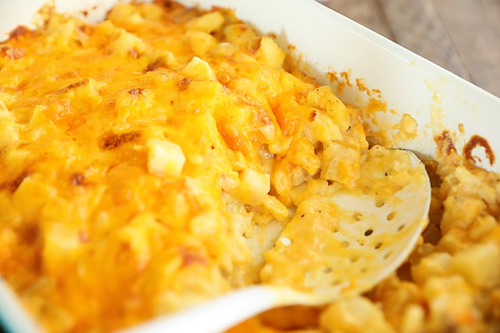 Scoop of Shortcut Cheese Scalloped Potatoes.