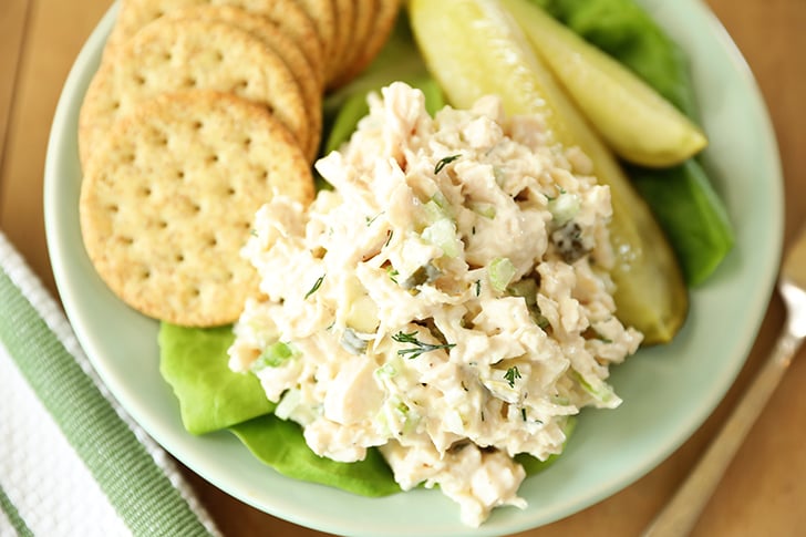 Dill Pickle Chicken Salad with crackers and pickles.