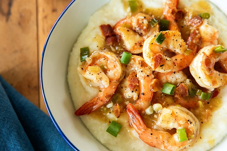 Shrimp and sauce over grits.