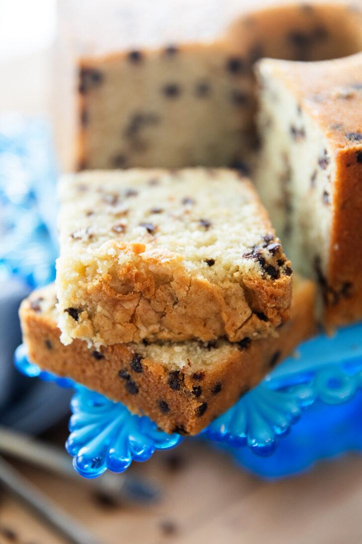 Sliced Chocolate Chip Pound Cake on a blue cake plate.